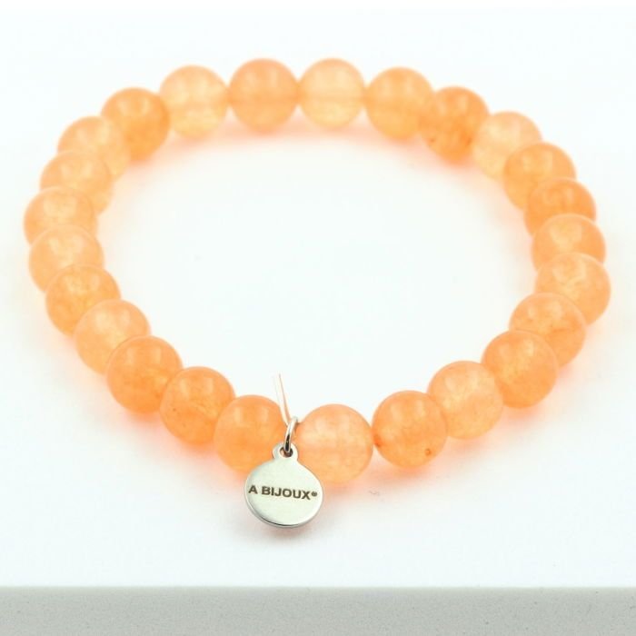 Kamienie i minerały. Bransoletka z pomarańczowych koralików chalcedonowych 8 mm. Wyprodukowano we Francji. Możliwość dostosowania rozmiaru.