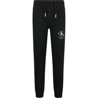 Spodnie sportowe damskie - CALVIN KLEIN JEANS Spodnie dresowe | Regular Fit - miniaturka - grafika 1
