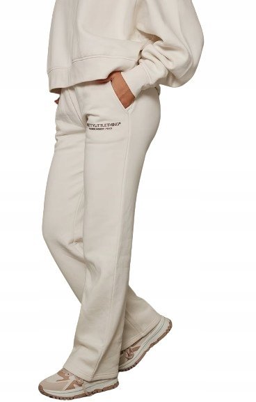 PRETTYLITTLETHING SPODNIE DRESOWE KREMOWE S EJO