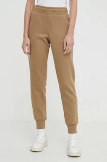 Spodnie damskie - G-Star Raw spodnie dresowe kolor beżowy gładkie - grafika 1