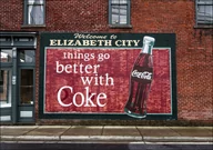 Plakaty - Coca-Cola mural that doubles as a welcome sign in Elizabeth City, North Carolina., Carol Highsmith - plakat 42x29,7 cm - miniaturka - grafika 1