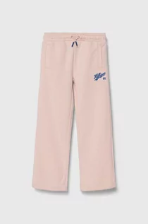 Spodnie i spodenki dla dziewczynek - Tommy Hilfiger spodnie dresowe dziecięce kolor różowy z aplikacją - grafika 1