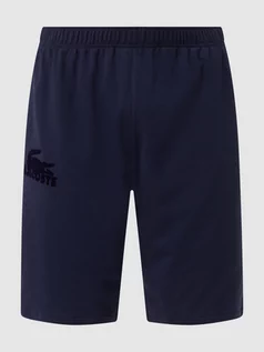 Spodnie sportowe męskie - Szorty z dzianiny dresowej z nadrukiem flokowym z logo - grafika 1