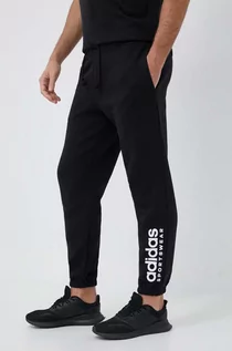 Spodnie męskie - adidas spodnie dresowe kolor czarny z nadrukiem - grafika 1