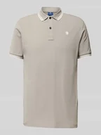 Koszulki męskie - Koszulka polo o kroju slim fit z przedłużonym tyłem model ‘Dunda’ - miniaturka - grafika 1