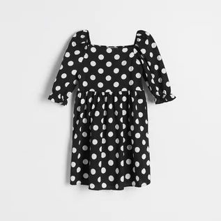 Sukienki i spódniczki dla dziewczynek - Reserved Bawełniana sukienka w grochy - Czarny - grafika 1