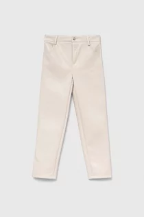 Spodnie i spodenki dla dziewczynek - Guess spodnie dziecięce kolor beżowy gładkie - grafika 1