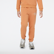 Spodnie męskie - Spodnie dziecięce New Balance YP31508SEI  pomarańczowe - miniaturka - grafika 1