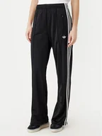 Spodnie sportowe damskie - adidas Spodnie dresowe adicolor Classic Firebird JC8245 Czarny Loose Fit - miniaturka - grafika 1