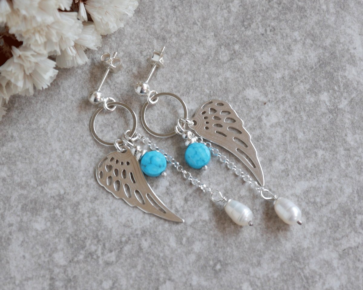 Kolczyki wiszące skrzydła z turkusem i perłą w srebrze