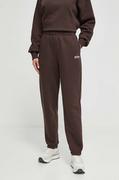 Spodnie damskie - New Balance spodnie dresowe kolor brązowy gładkie - miniaturka - grafika 1