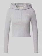 Bluzki damskie - Bluzka o kroju slim fit z długim rękawem, kapturem i wyhaftowanym logo - miniaturka - grafika 1