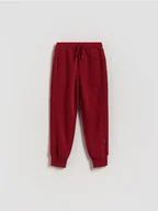 Spodnie i spodenki dla chłopców - Reserved - Dzianinowe joggery - czerwony - miniaturka - grafika 1
