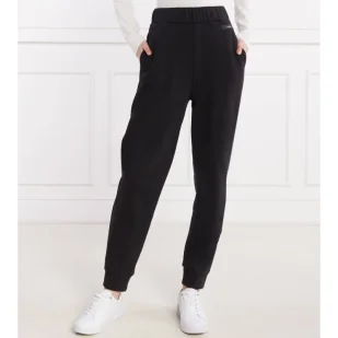Calvin Klein Spodnie dresowe | Relaxed fit - Dresy damskie - miniaturka - grafika 1