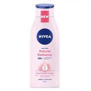 Balsamy i kremy do ciała - Nivea Natural Radiance 48H mleczko do ciała 400ml - miniaturka - grafika 1