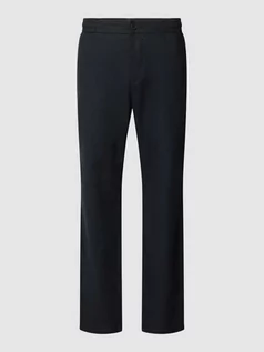 Spodnie męskie - Spodnie o kroju regular fit z mieszanki lnu i bawełny z elastycznym pasem - grafika 1