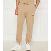 Dresy męskie - HUGO Spodnie dresowe Dusplitan | Loose fit - miniaturka - grafika 1