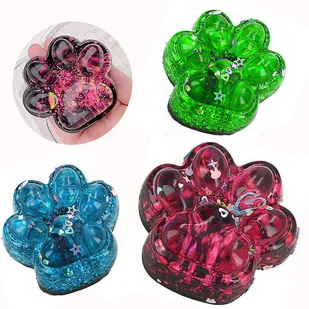 GNIOTEK SQUISHY ANTYSTRESOWY KOCIA ŁAPKA Z BROKATEM 1SZT - Zabawki sensoryczne - miniaturka - grafika 1