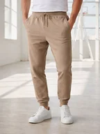 Dresy męskie - Spodnie dresowe z kieszeniami brązowy L - miniaturka - grafika 1