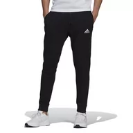 Spodnie sportowe męskie - Spodnie dresowe adidas Essentials Fleece Regular Fit Tapered Cuff GK9268 - czarne - miniaturka - grafika 1