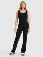 Spodnie sportowe damskie - 4F Spodnie dresowe z prostymi nogawkami z modalem damskie - czarne XS - miniaturka - grafika 1