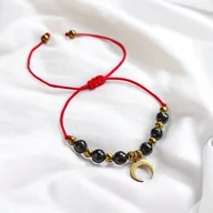 Bransoletki - OCHRONNA bransoletka - czarny turmalin - lunula : czerwony sznurek - miniaturka - grafika 1