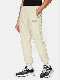 Karl Kani Spodnie dresowe Sport Patch Essential 60030075 Beżowy Relaxed Fit - Spodnie sportowe męskie - miniaturka - grafika 1