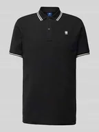 Koszulki męskie - Koszulka polo o kroju slim fit z przedłużonym tyłem model ‘Dunda’ - miniaturka - grafika 1