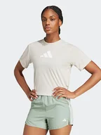 Koszulki i topy damskie - adidas Koszulka w kolorze kremowym - miniaturka - grafika 1
