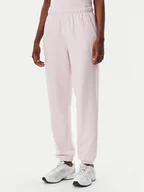 Spodnie sportowe damskie - New Balance Spodnie dresowe Essentials WP41500 Różowy Relaxed Fit - miniaturka - grafika 1