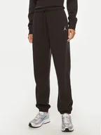 Dresy damskie - Nike Spodnie dresowe Brooklyn FN4494 Czarny Regular Fit - miniaturka - grafika 1