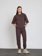 Spodnie sportowe damskie - BGN Spodnie dresowe w kolorze brązowym - miniaturka - grafika 1