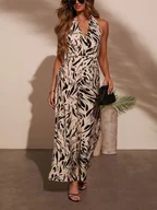 Kombinezony - Milan Kiss Kombinezon w kolorze beżowo-czarnym - miniaturka - grafika 1