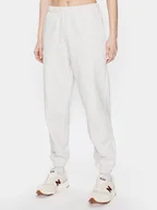 Spodnie sportowe damskie - New Balance Spodnie dresowe Athletics Remastered French Terry WP31503 Beżowy Relaxed Fit - miniaturka - grafika 1