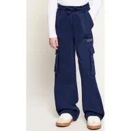 Spodnie sportowe damskie - Guess Spodnie dresowe flare fit - miniaturka - grafika 1