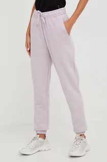 Spodnie damskie - 4F spodnie dresowe damskie kolor fioletowy gładkie - grafika 1