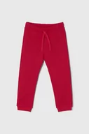 Spodnie i spodenki dla dziewczynek - United Colors of Benetton spodnie dresowe bawełniane dziecięce kolor różowy gładkie - miniaturka - grafika 1