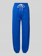 Spodnie sportowe damskie - Spodnie dresowe z elastycznym ściągaczem - miniaturka - grafika 1