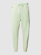 Spodnie sportowe męskie - Spodnie dresowe z elastycznym pasem model ‘Hadiko’ - miniaturka - grafika 1