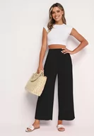 Spodnie damskie - Czarne Bawełniane Szerokie Spodnie Alladynki z Wysokim Stanem i Gumką w Talii Risalles - miniaturka - grafika 1
