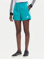 Spodenki damskie - adidas Szorty sportowe Tiro x Common Goal JL9208 Turkusowy Loose Fit - miniaturka - grafika 1
