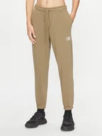 Spodnie sportowe damskie - New Balance Spodnie dresowe Essentials French Terry Pant WP33508 Zielony Regular Fit - miniaturka - grafika 1
