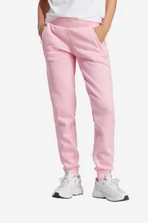 Spodnie i spodenki dla dziewczynek - adidas Originals spodnie dresowe IA6455 kolor różowy gładkie - grafika 1