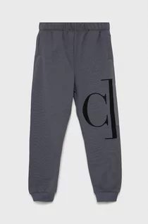 Spodnie damskie - Calvin Klein Jeans Jeans Spodnie bawełniane dziecięce kolor szary z nadrukiem - grafika 1