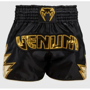 Venum Spodenki Muay Thai Inferno Black/Gold - Spodnie sportowe męskie - miniaturka - grafika 1