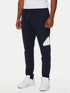 Spodnie sportowe męskie - adidas Spodnie dresowe Future Icons Badge of Sport IW8584 Granatowy Regular Fit - miniaturka - grafika 1