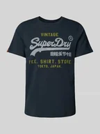 Koszulki męskie - T-shirt o luźnym kroju z nadrukiem z logo - miniaturka - grafika 1