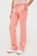 Spodnie damskie - Guess spodnie dresowe kolor pomarańczowy z nadrukiem - miniaturka - grafika 1