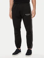 Spodnie sportowe męskie - Tommy Hilfiger Spodnie dresowe Monotype MW0MW33701 Czarny Regular Fit - miniaturka - grafika 1