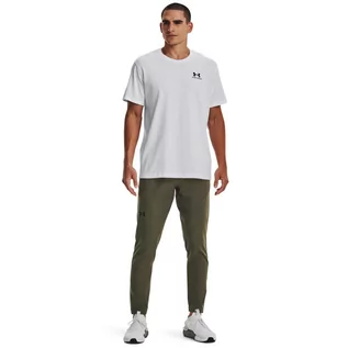 Spodnie sportowe męskie - Męskie spodnie treningowe UNDER ARMOUR  UNSTOPPABLE TAPERED PANTS - oliwkowe/khaki - grafika 1